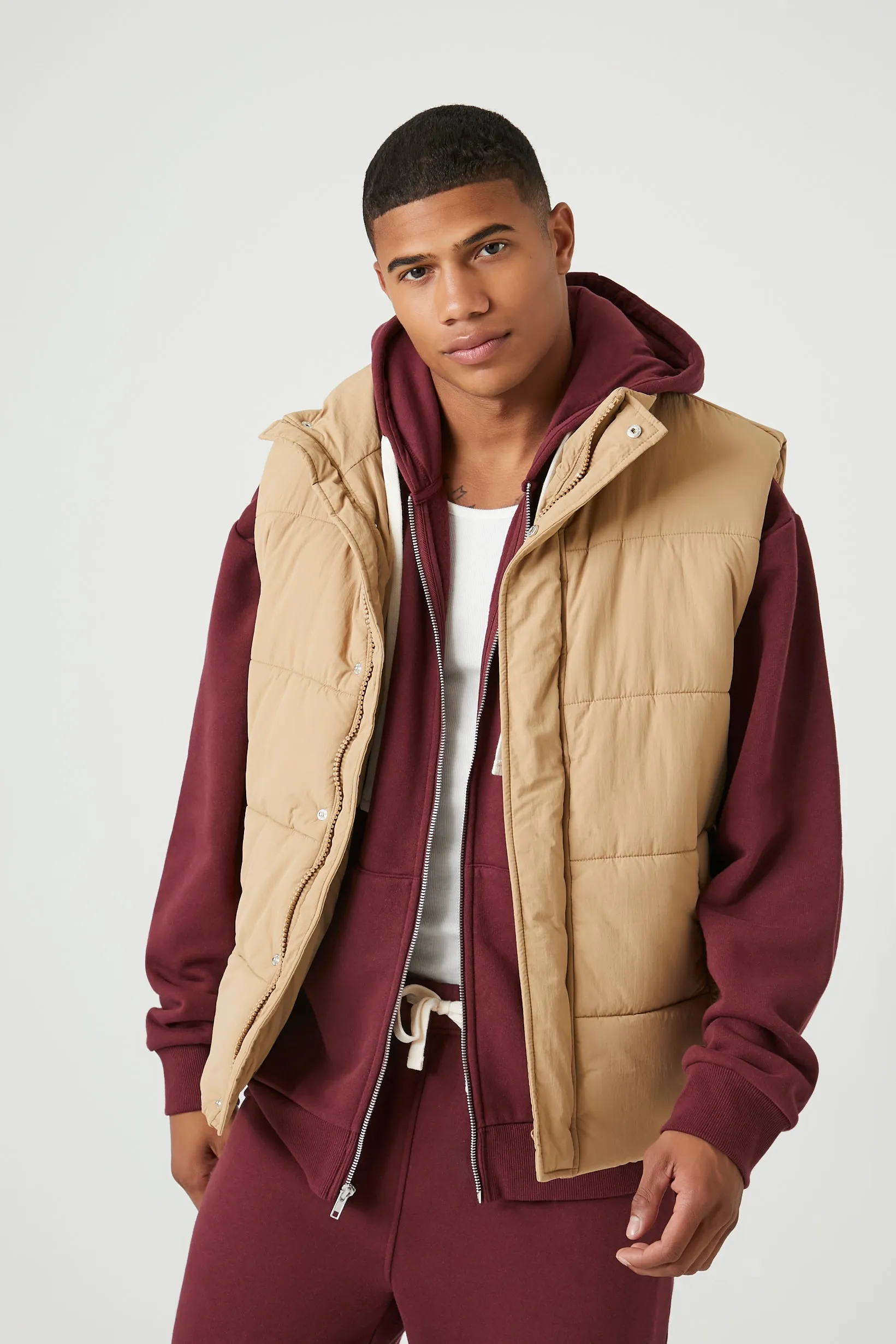 Funnel Neck Puffer Vest sold by Urban Planet