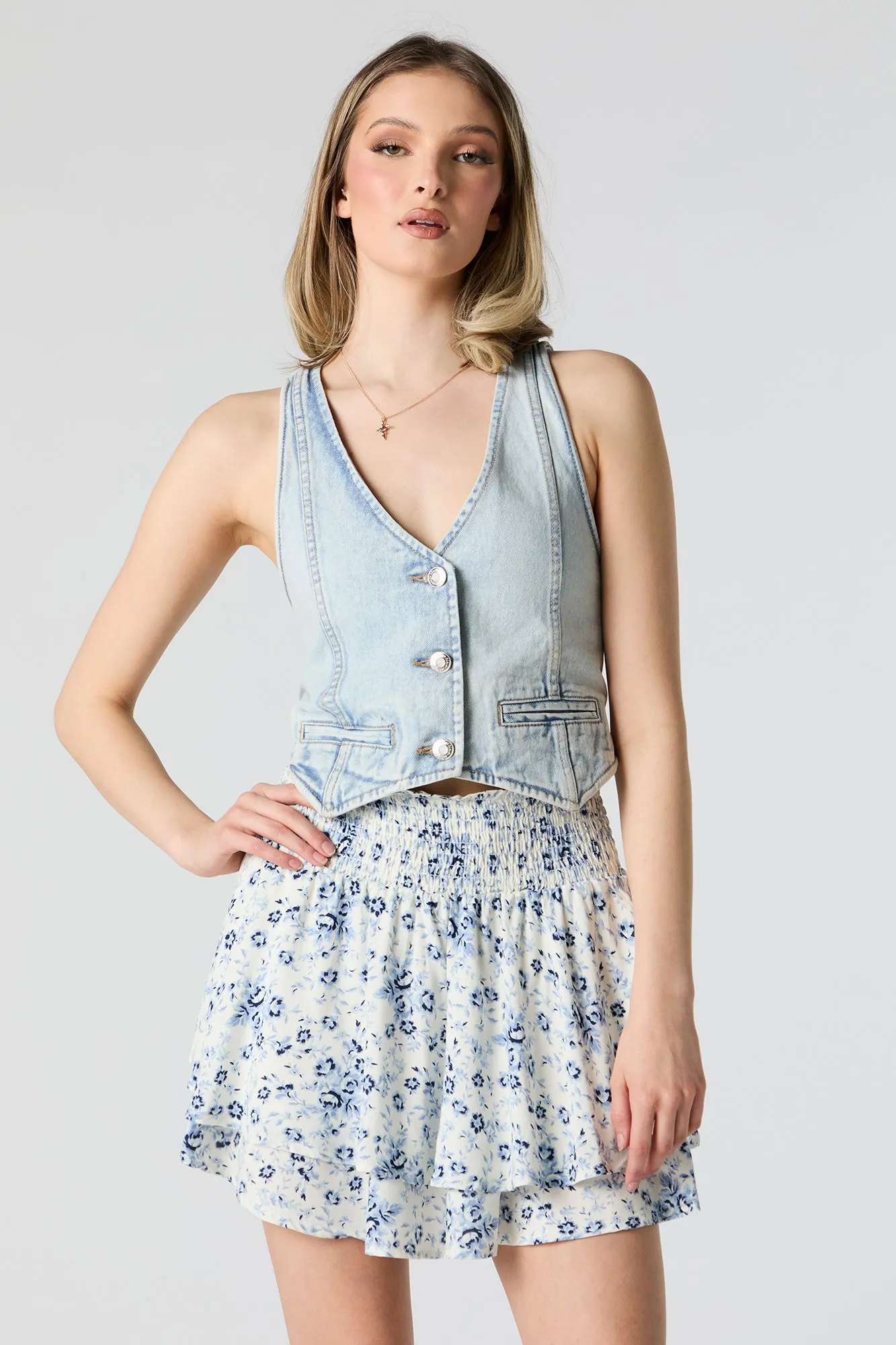 Minijupe volantée fleurie bleue sold by Urban Planet