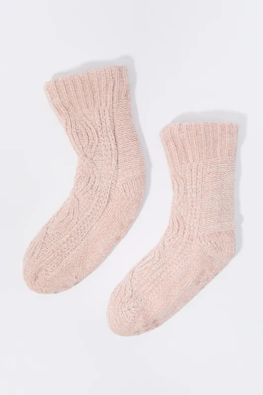 Pantoufles-chaussettes en tricot torsadé sold by Urban Planet