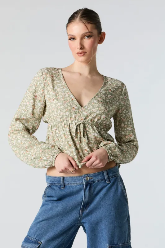 Haut à basque fleuri à encolure en V sold by Urban Planet