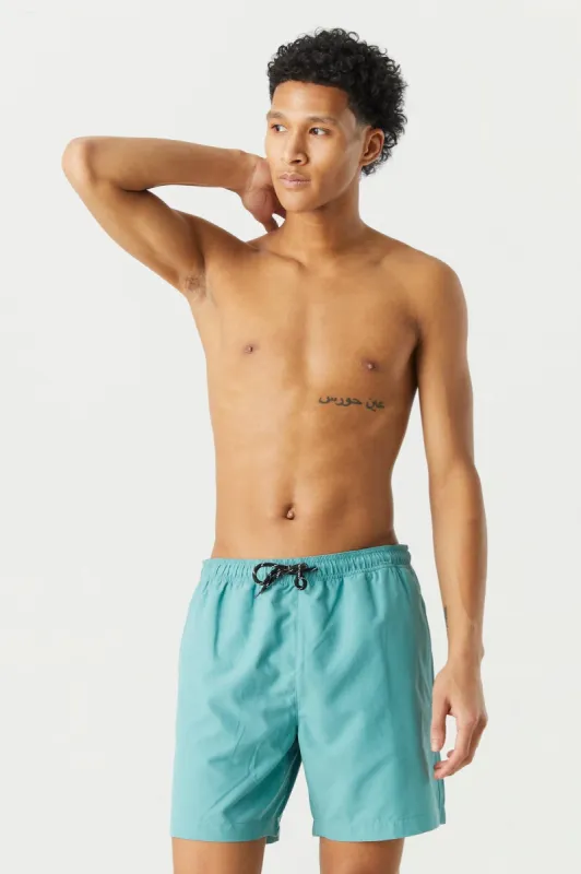 Short de surf uni coloree sold by Urban Planet