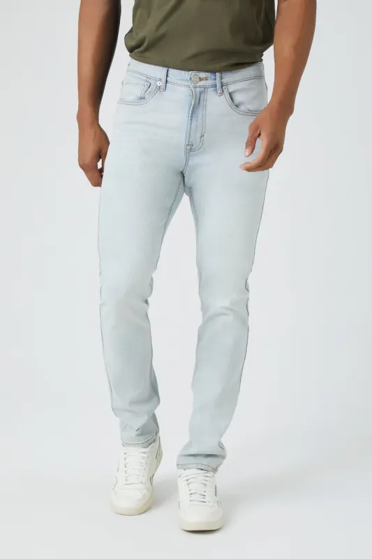 Jean ajusté en denim délavé pâle sold by Urban Planet