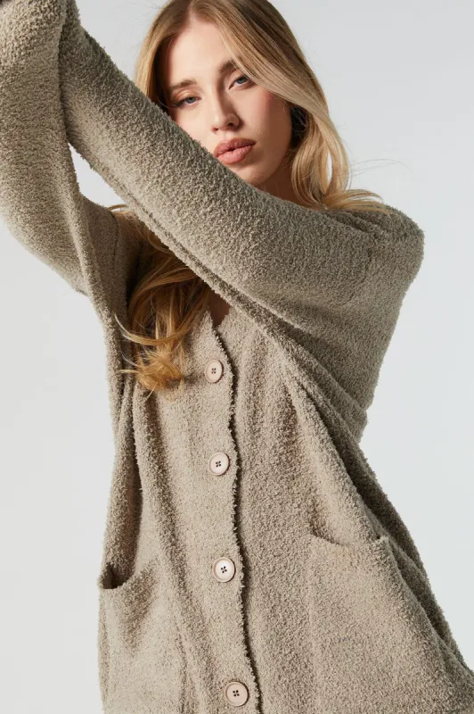 Cardigan boutonné pelucheux sold by Urban Planet