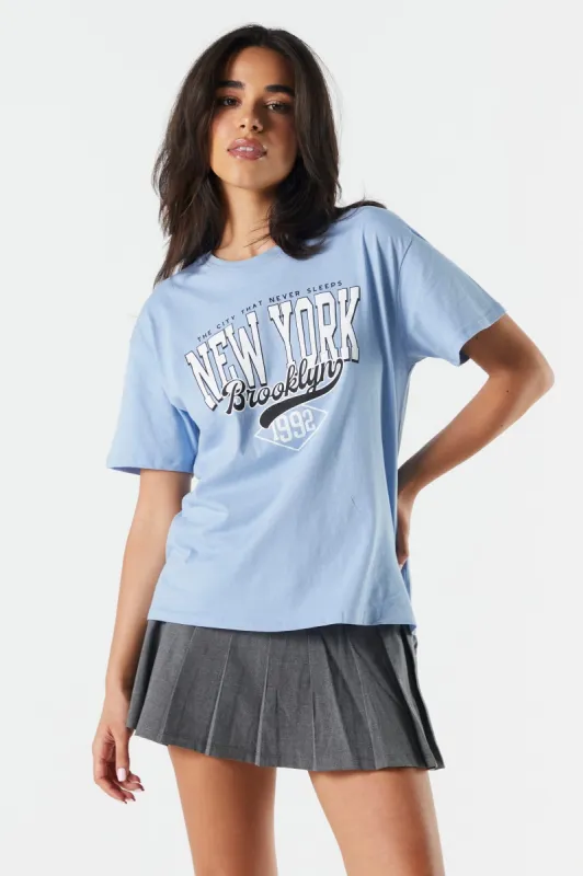 T-shirt de coupe garçonne bleu à imprimé New York sold by Urban Planet