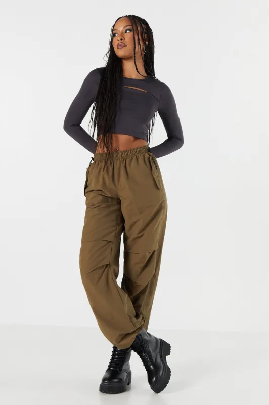 Pantalon parachute en nylon sold by Urban Planet