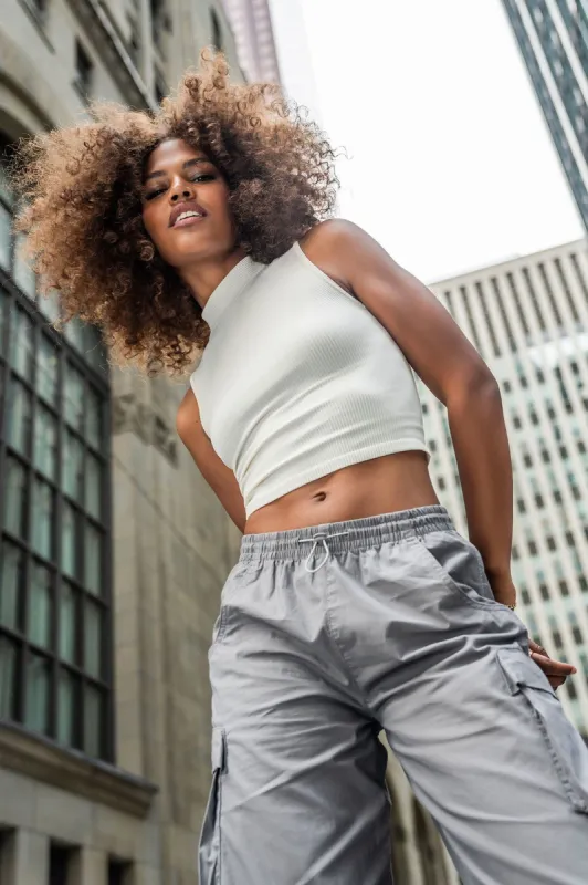 Solid Seamless Ribbed Mock Neck Skimmer Tank sold by Urban Planet