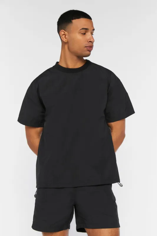 Short avec poches plaquées et taille coulissante sold by Urban Planet