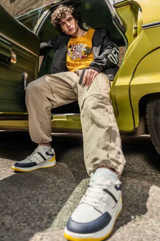 Pantalon cargo en nylon avec fermeture à glissière sold by Urban Planet