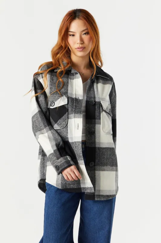 Blouson-chemisier à carreaux noirs et blancs sold by Urban Planet