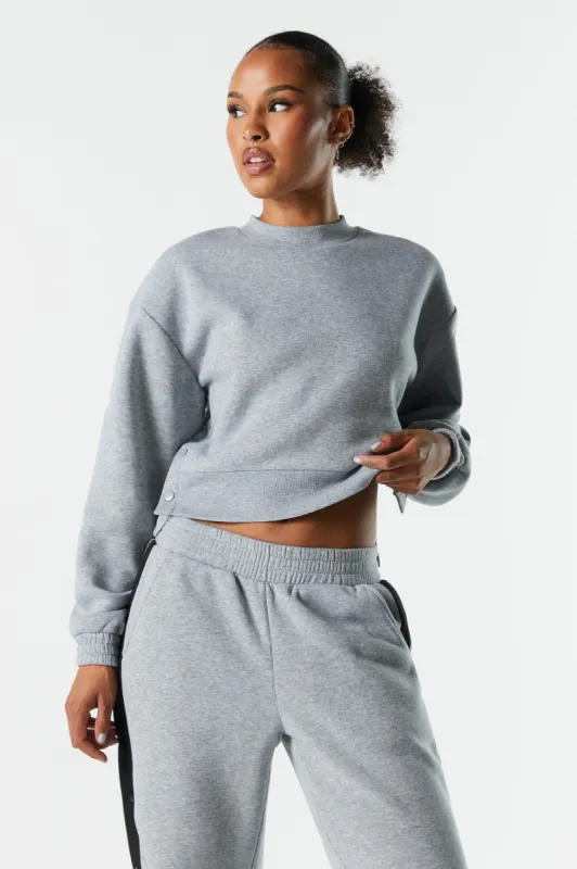 Fleece Buttoned Crewneck Sweatshirt sold by Urban Planet