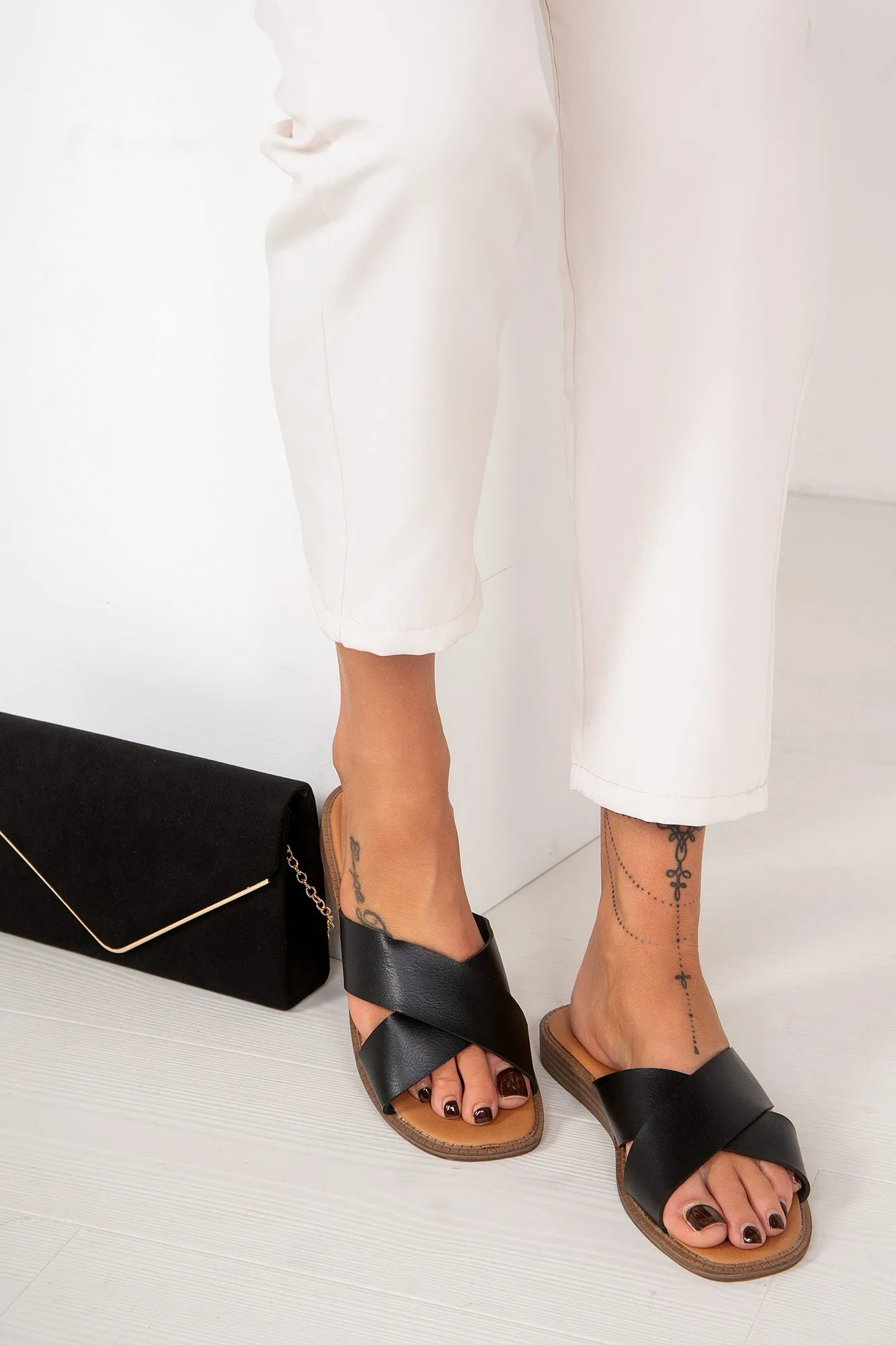 Udelia Black Faux Leather Sliders sold by Va Va Voom