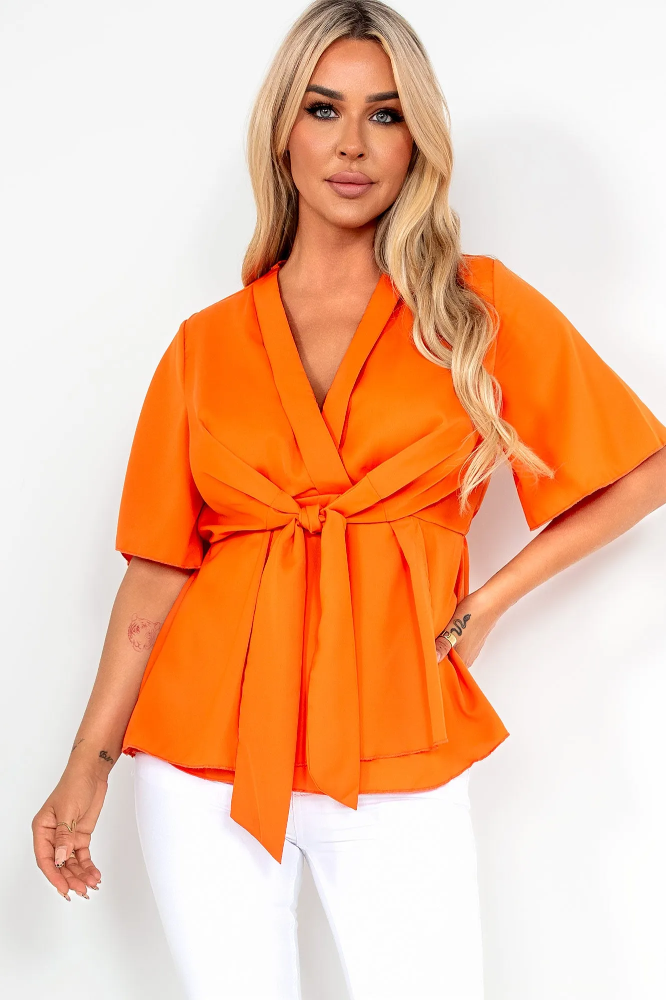 Frida Orange Tie Front Wrap Top sold by Va Va Voom