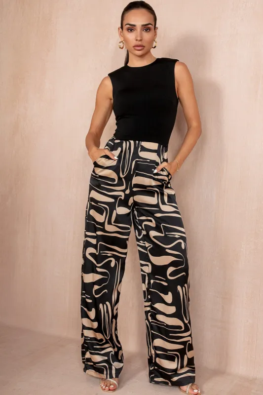 AX Paris Dodi Black Print Jumpsuit sold by Va Va Voom