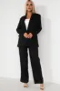 Fern Black Linen Trousers sold by Va Va Voom