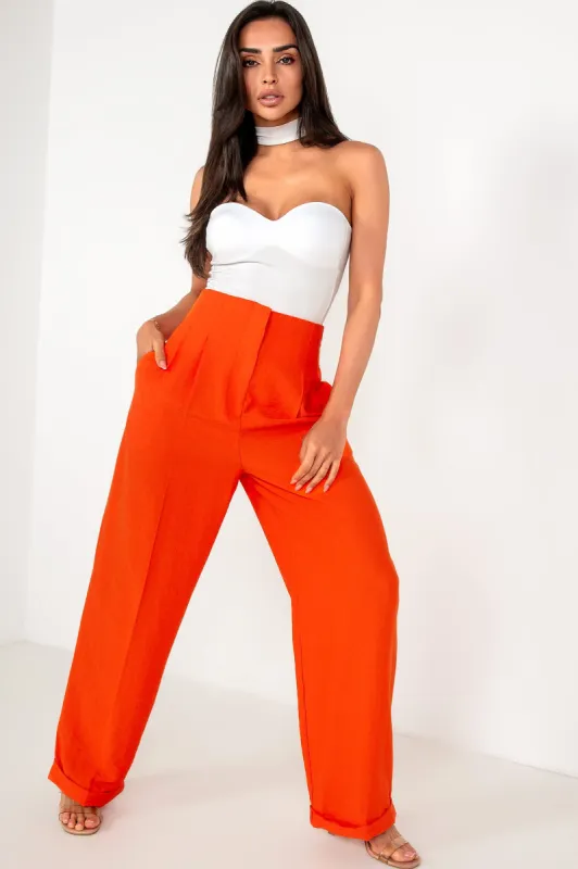Althea Orange Tailored Trousers sold by Va Va Voom