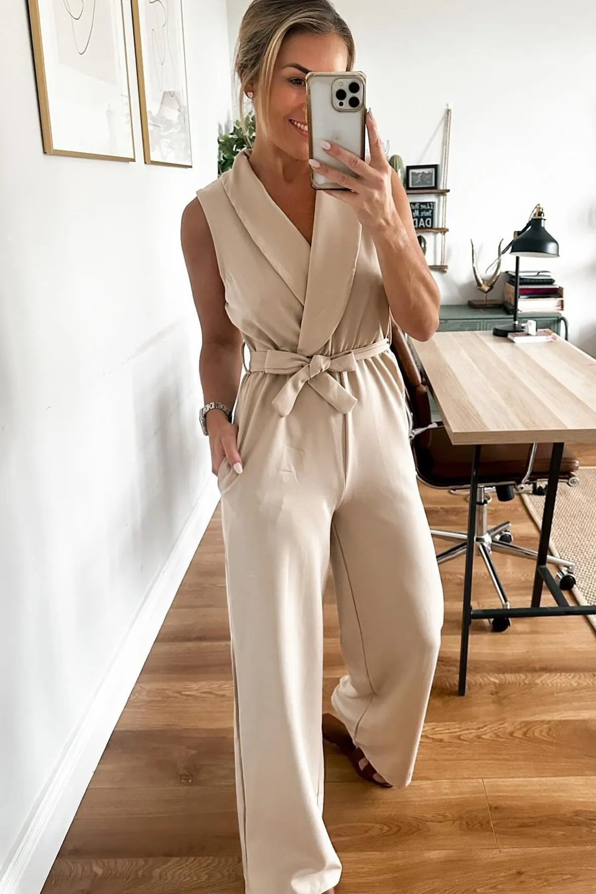 Sonia Stone Sleeveless Belted Jumpsuit sold by Va Va Voom