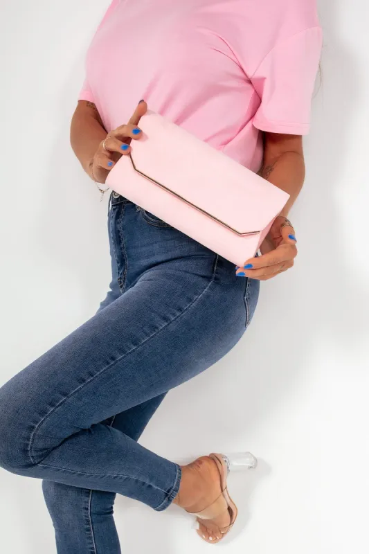 Trixie Pink Suedette Clutch sold by Va Va Voom