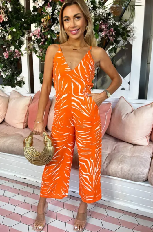Jordyn Orange Animal Print Jumpsuit sold by Va Va Voom