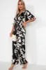 Viola Monochrome Satin Floral Jumpsuit sold by Va Va Voom