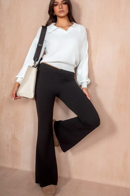 Inga Black Flared Trousers sold by Va Va Voom