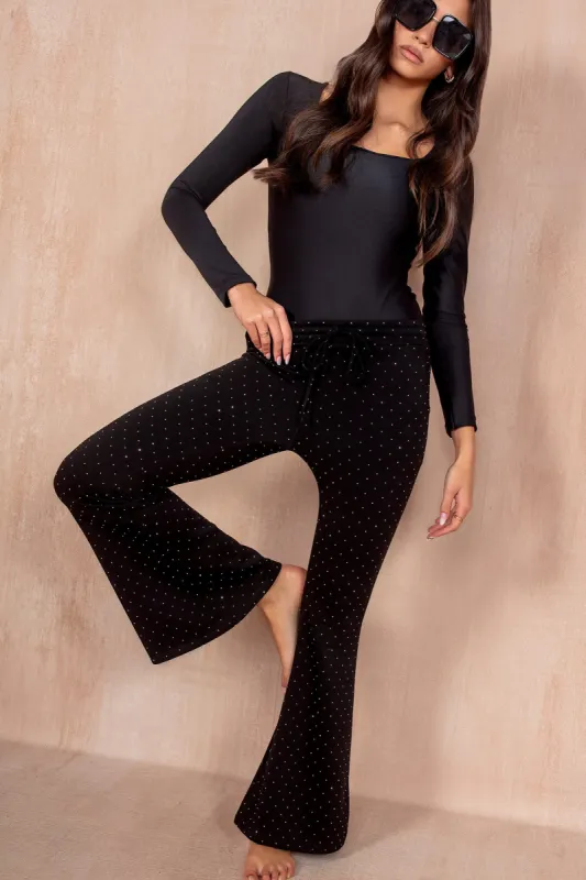 Missy Black Sparkle Flared Trousers sold by Va Va Voom