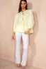 Jean Lemon Cotton Peplum Top sold by Va Va Voom