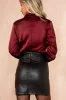 Thea Black Faux Leather Wrap Skirt sold by Va Va Voom