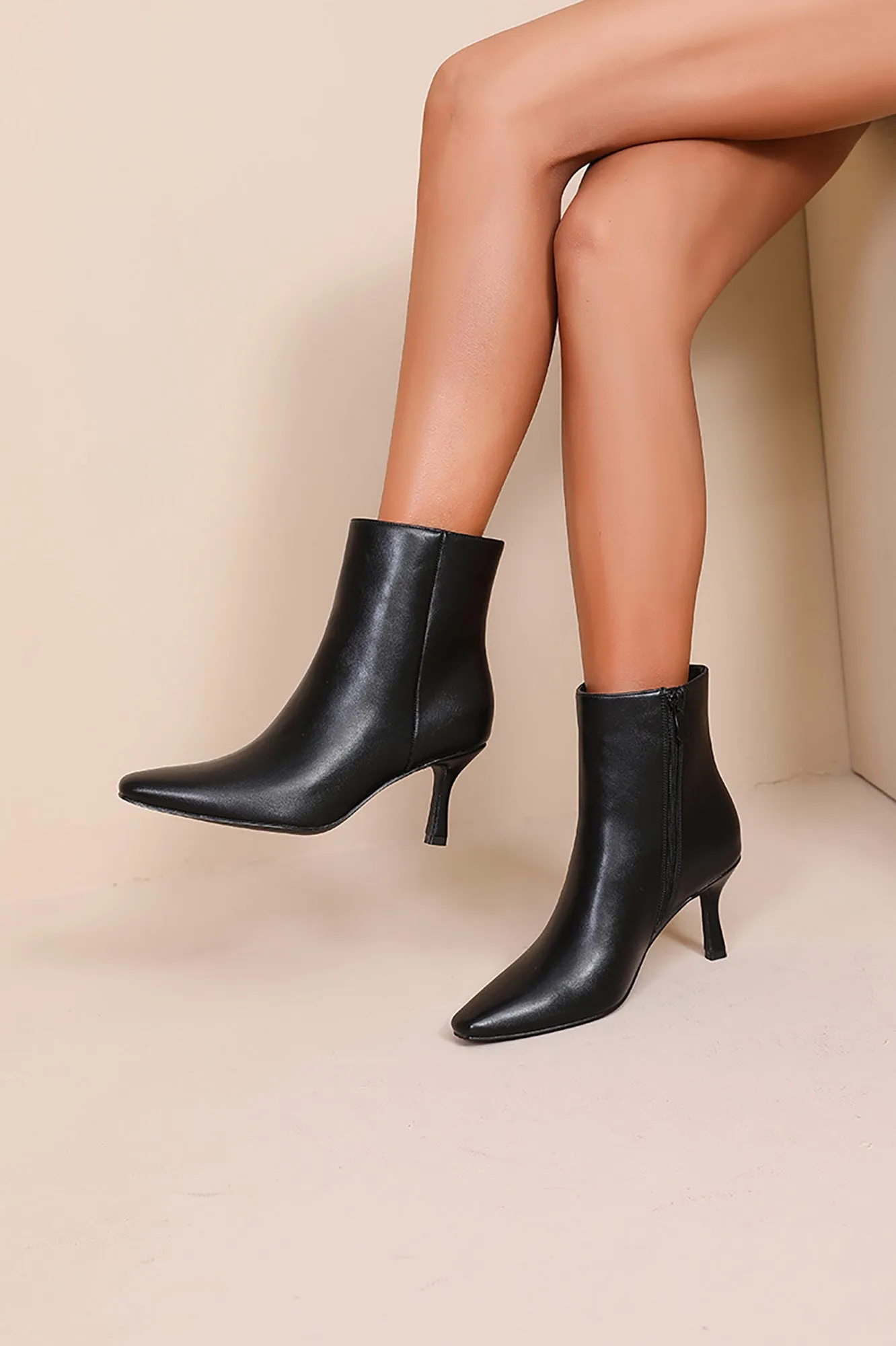River Faux Leather Point Toe Ankle Boots sold by Va Va Voom