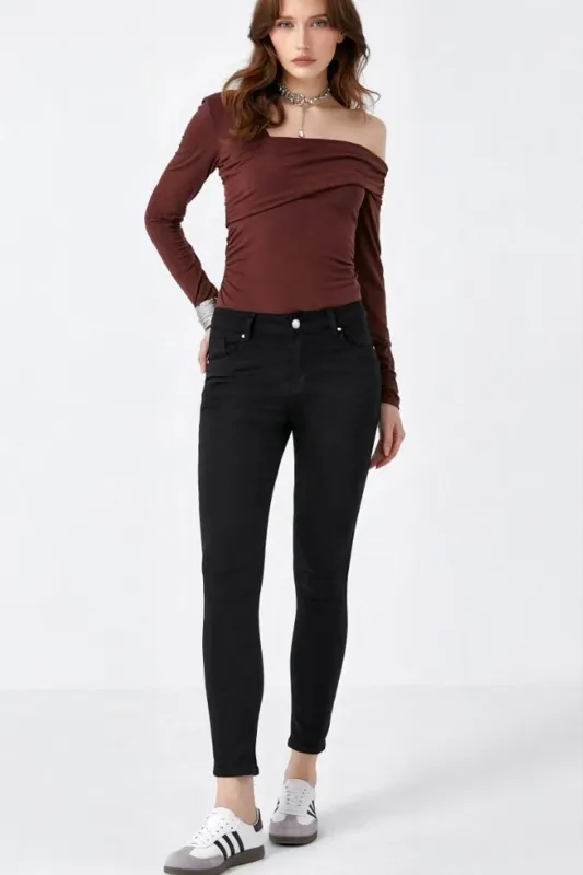 Natalia Black Mid Rise Skinny Jeans sold by Vavavoom