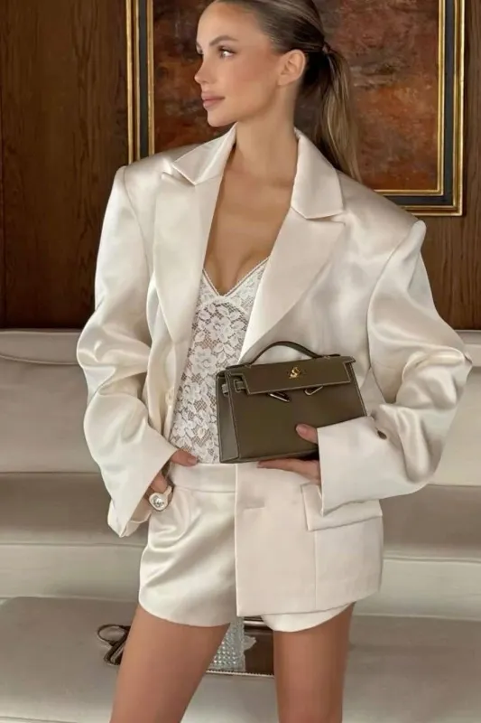 Sacha Ivory Satin Shoulder Pad Blazer sold by Vavavoom