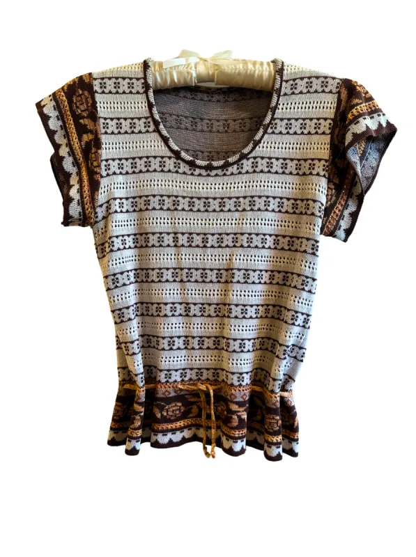 The Hand Knit 70’s Top sold by Vanessa Mooney