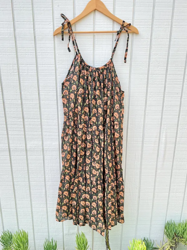 SAMPLE: Flowy Cotton Mini Dress Dark Floral sold by Vanessa Mooney