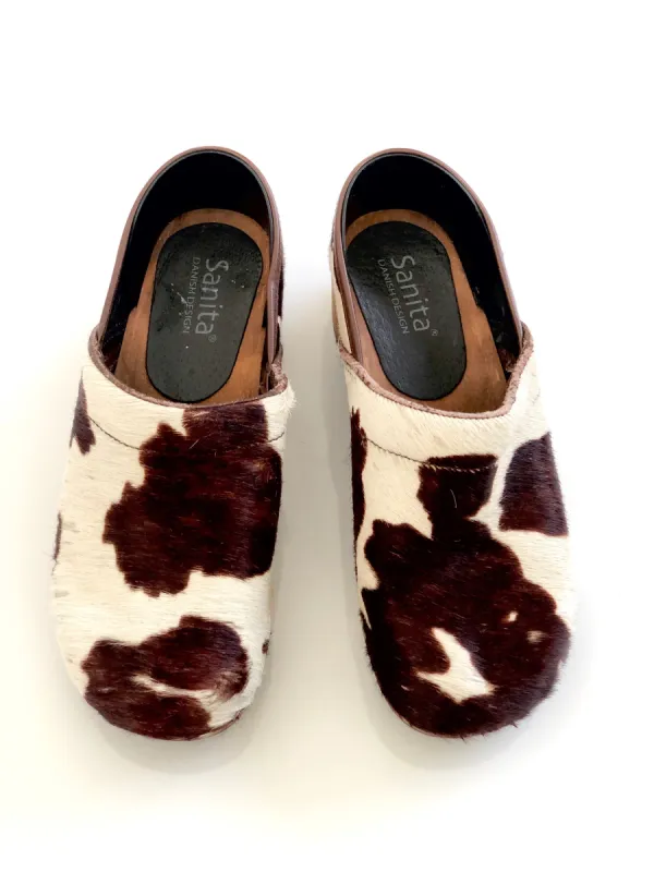 VINTAGE: Brown & White Cowhide Clogs sold by Vanessa Mooney