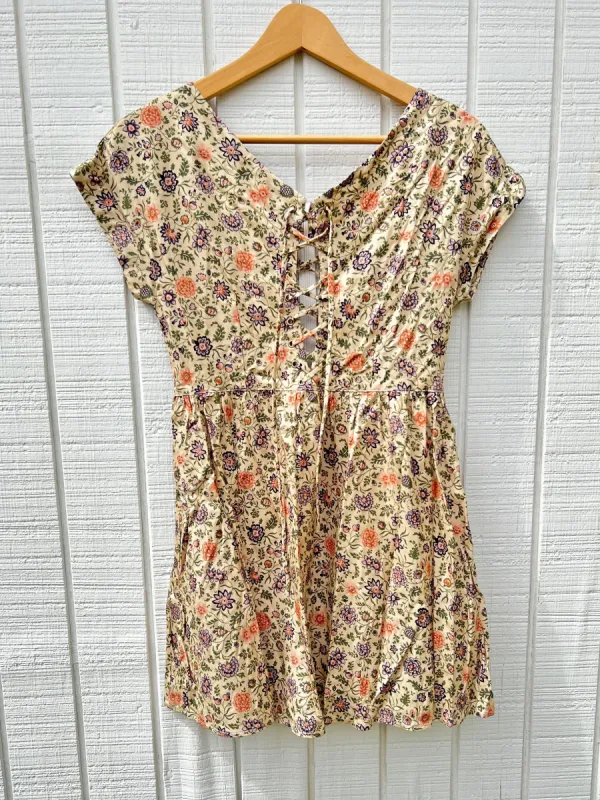 SAMPLE:  Light Floral Lace-Up Mini Dress sold by Vanessa Mooney