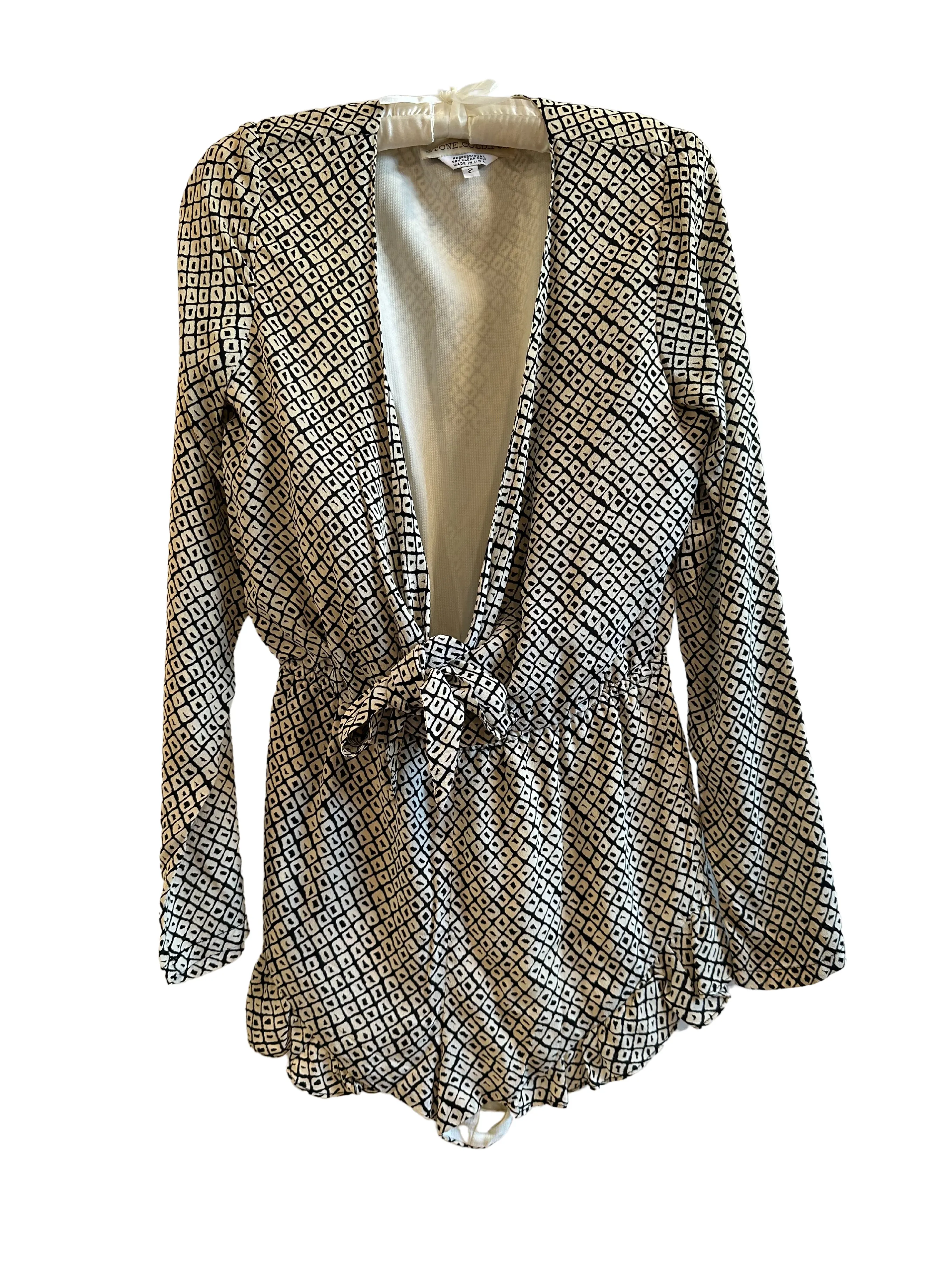 Stone Cold Fox Black & White Romper sold by Vanessa Mooney