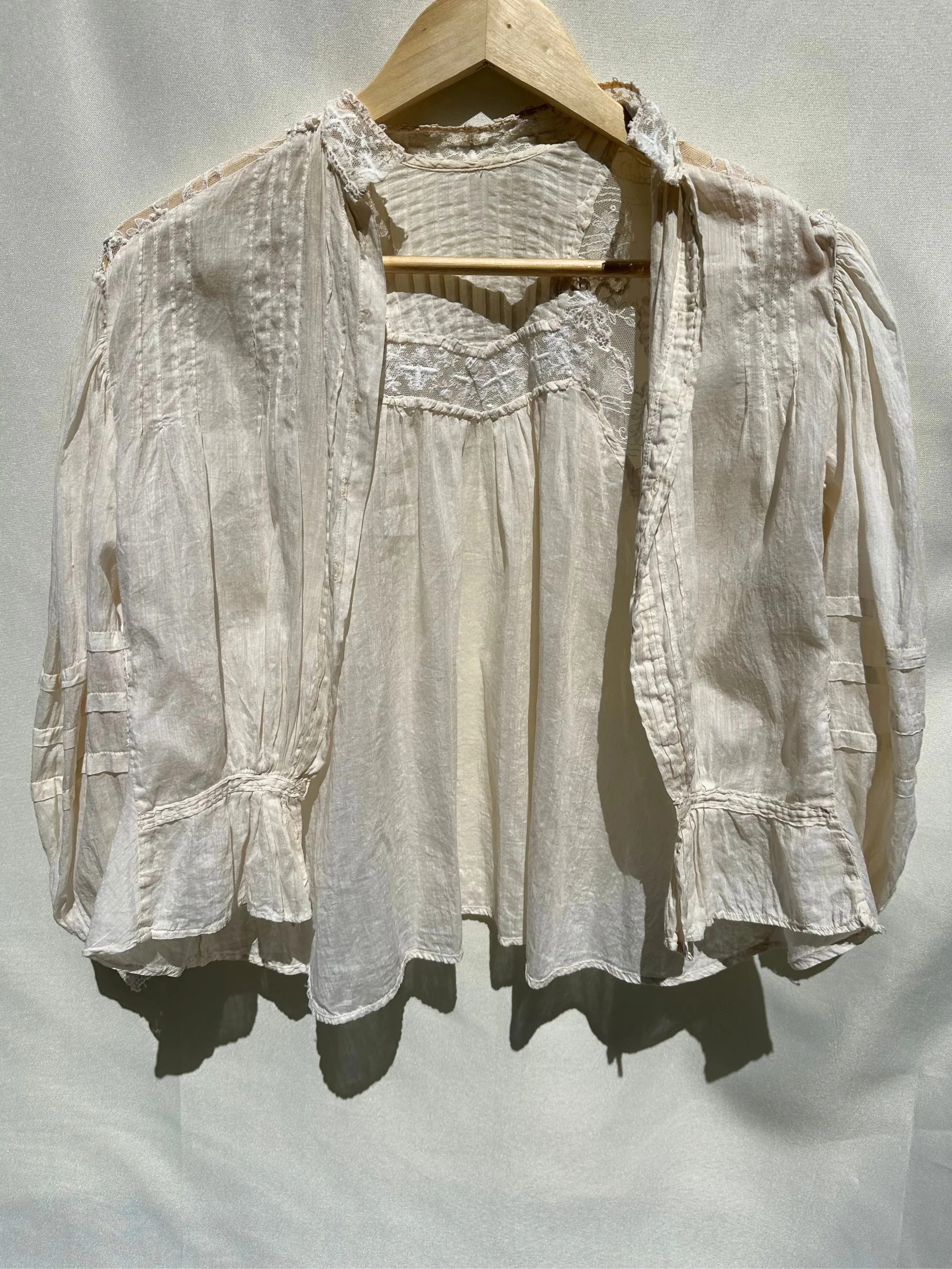 Open front blouse with puff sleeves sold by Vanessa Mooney