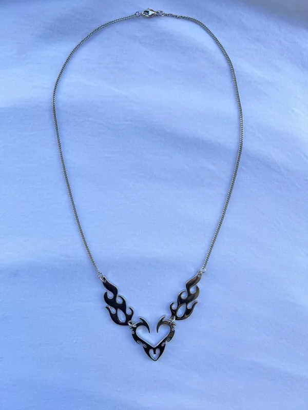 The Flaming Heart Necklace sold by Vanessa Mooney