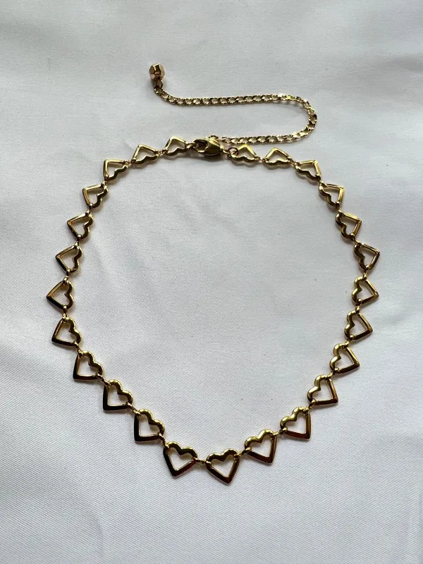 The Gold Heart Choker sold by Vanessa Mooney