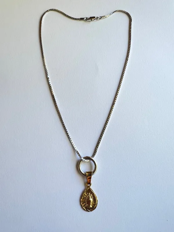 The Silver Religion Necklace sold by Vanessa Mooney