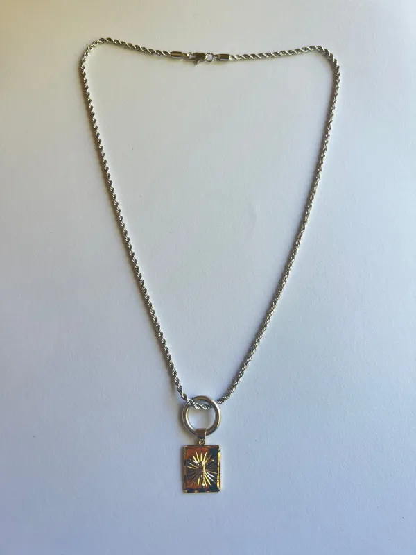 The Silver Religion Necklace sold by Vanessa Mooney