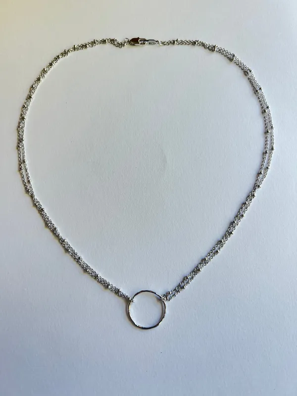 The Silver Ring Necklace sold by Vanessa Mooney