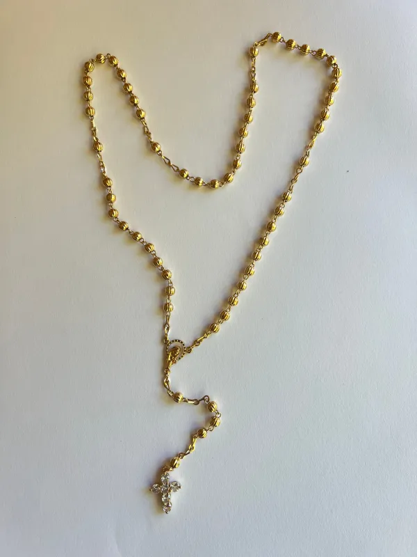 The Crystal Cross Rosary sold by Vanessa Mooney