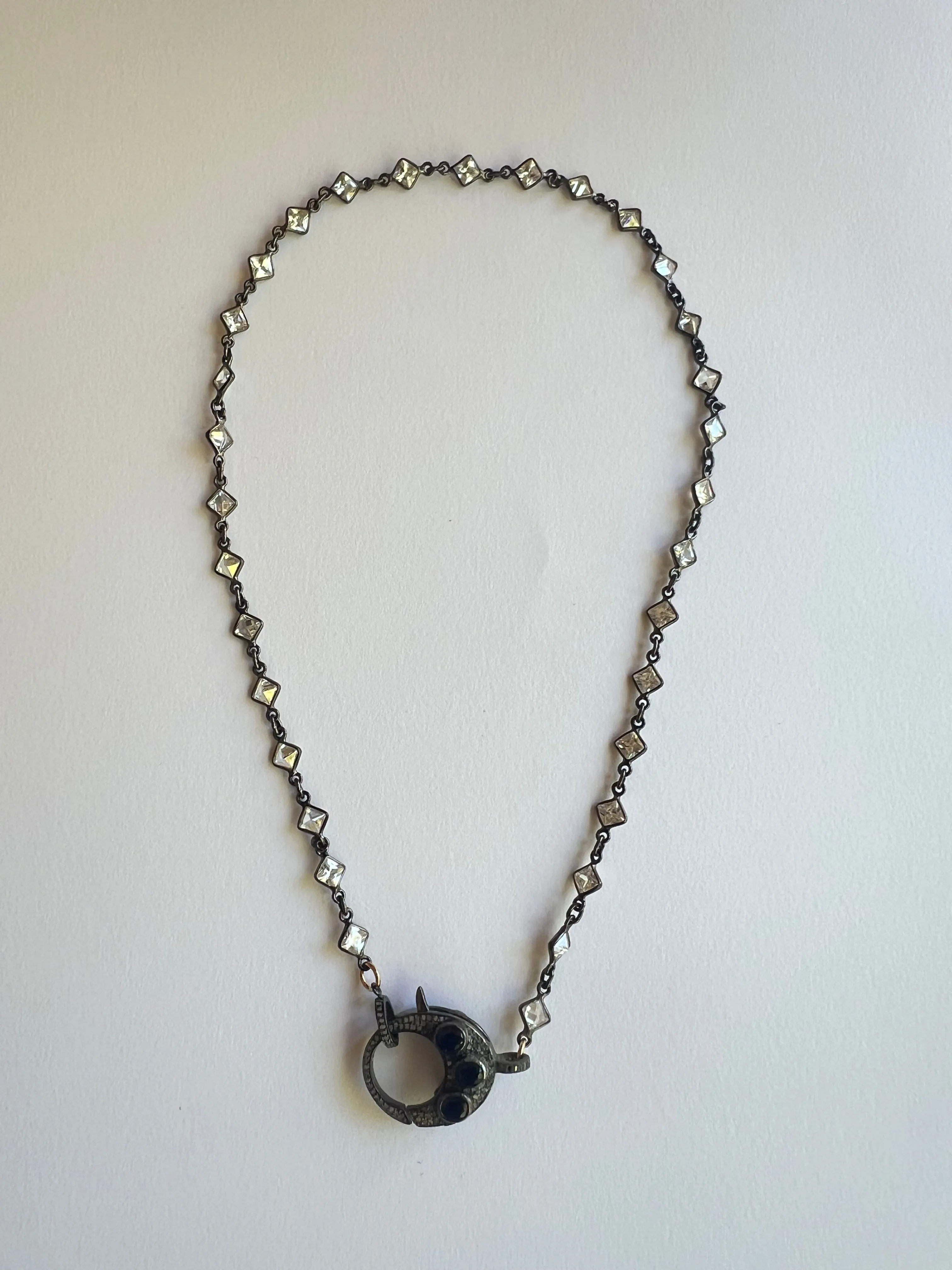 The Diamond & Sapphire Clasp Necklace sold by Vanessa Mooney