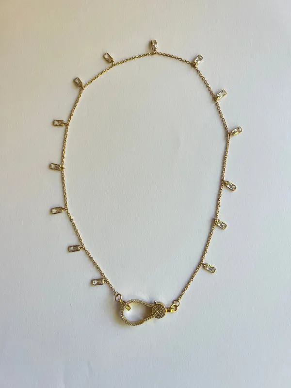 The Crystal & Clasp Necklace sold by Vanessa Mooney