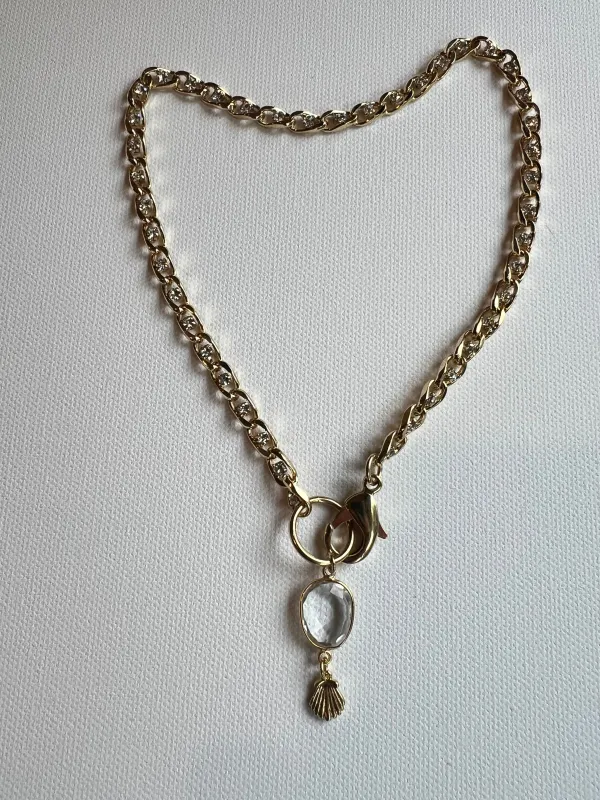 The Crystal & Gold Chain Shell Necklace sold by Vanessa Mooney