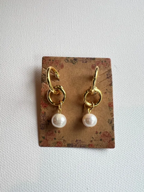 The Pearl Double Hoop Earrings sold by Vanessa Mooney