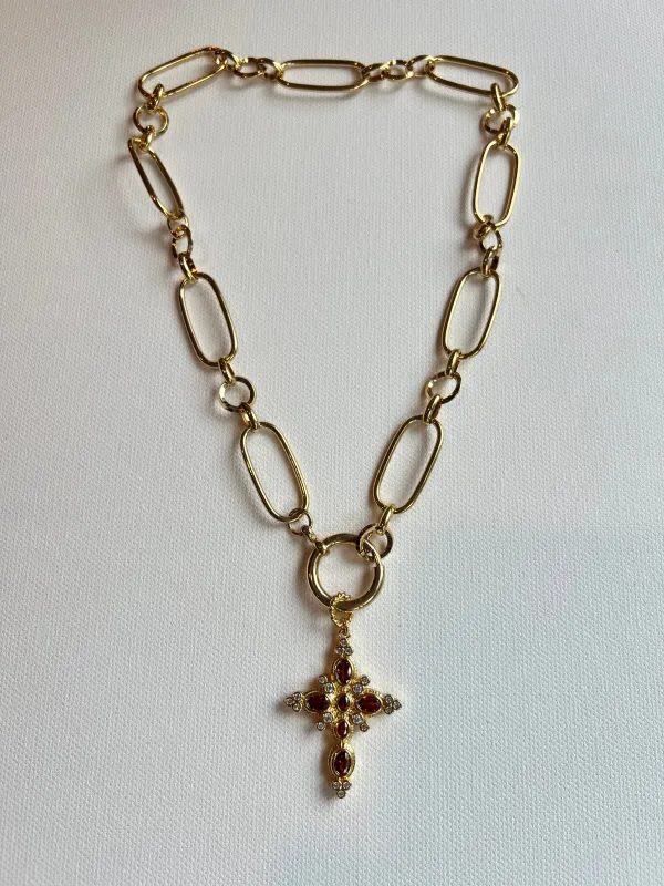 The Ruby Cross Necklace sold by Vanessa Mooney