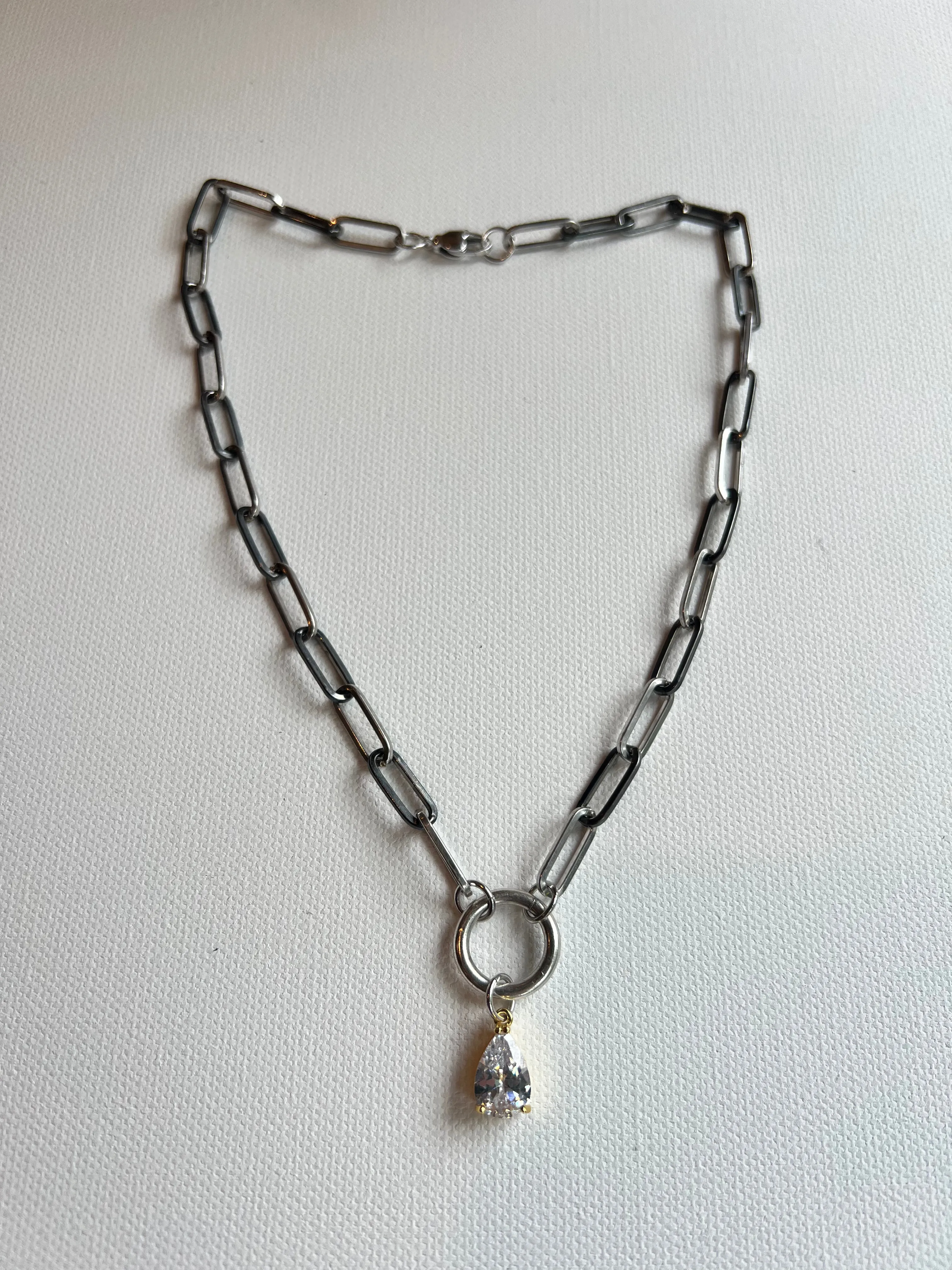 The Silver Chain & Charm Necklace sold by Vanessa Mooney