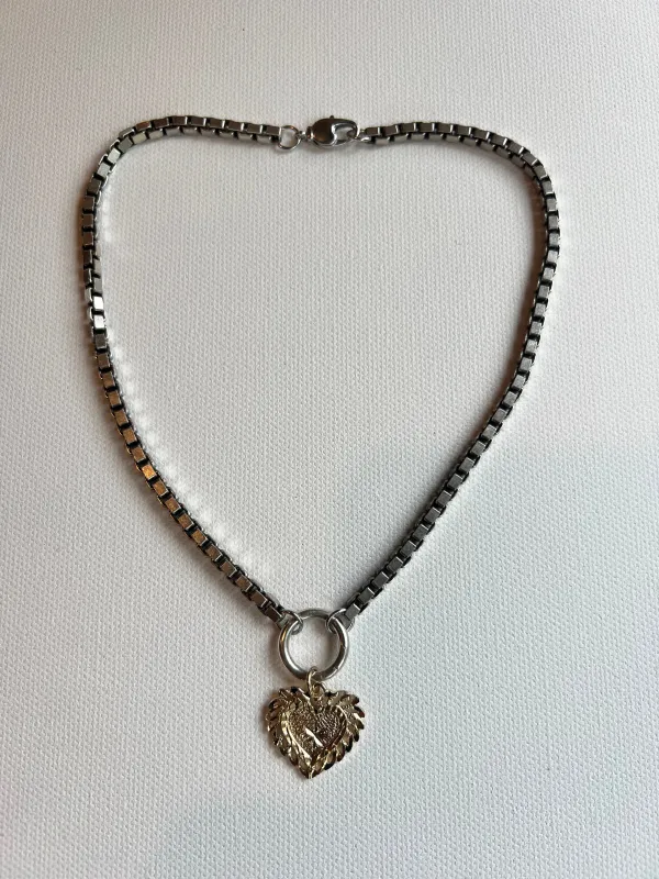 The Silver Chain & Heart Charm Necklace sold by Vanessa Mooney
