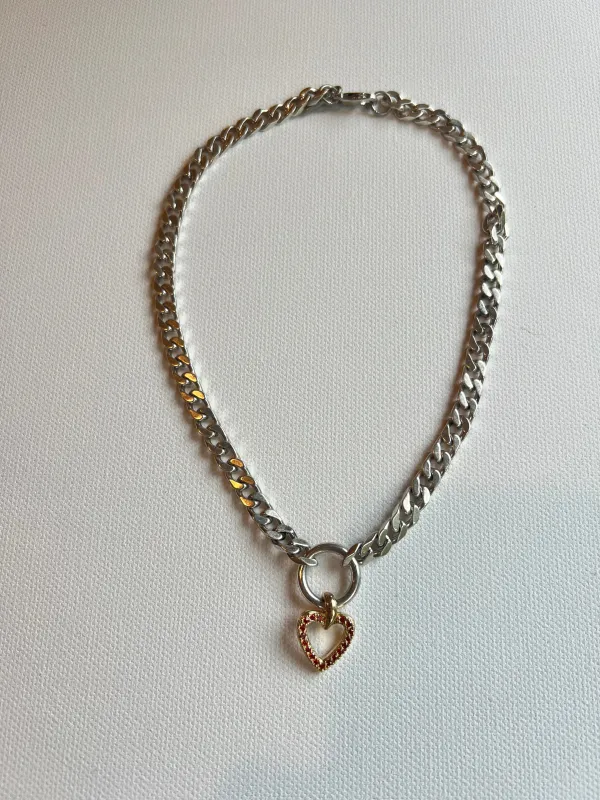 The Silver Chain & Red Heart Necklace sold by Vanessa Mooney